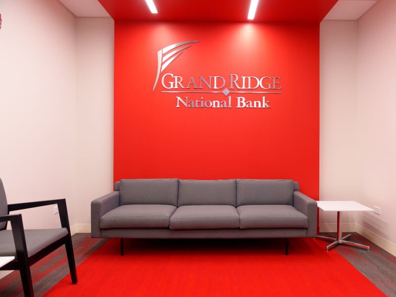 lounge with bright red wall and carpet