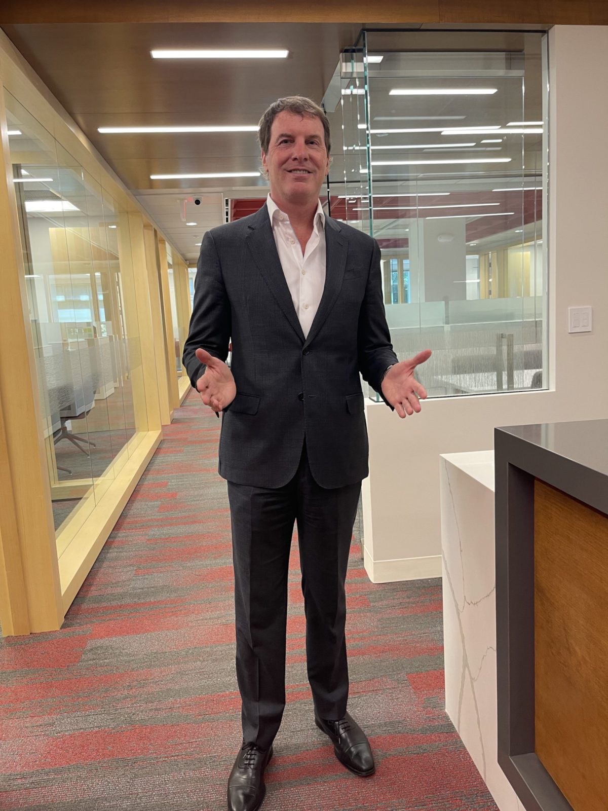 CEO at building entrance Man in business suit
